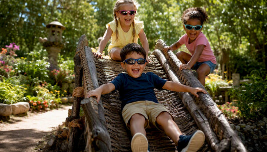 Children playing outdoors wearing UV sunglasses